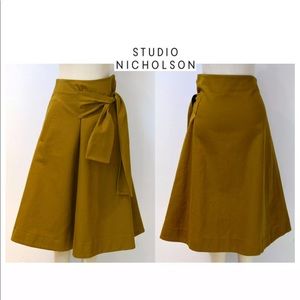 Studio Nicholson ochre cotton canvas midi skirt 0